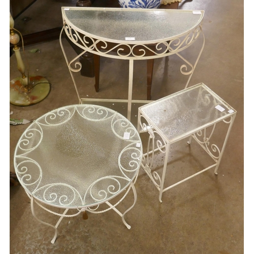 359 - Three wrought iron and glass topped tables