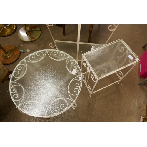 359 - Three wrought iron and glass topped tables