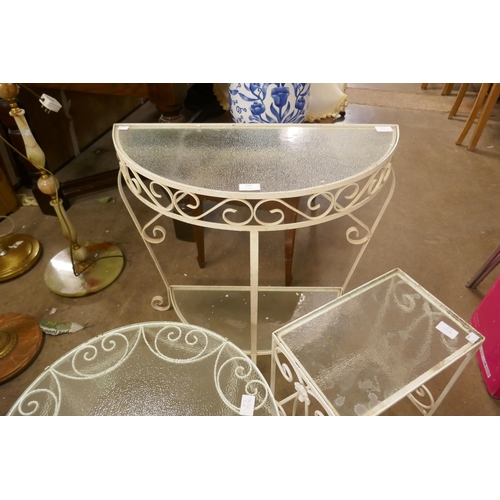 359 - Three wrought iron and glass topped tables