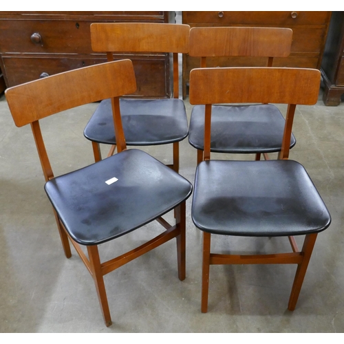 40 - A set of teak dining chairs