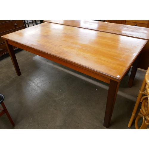 42 - A teak rectangular dining table