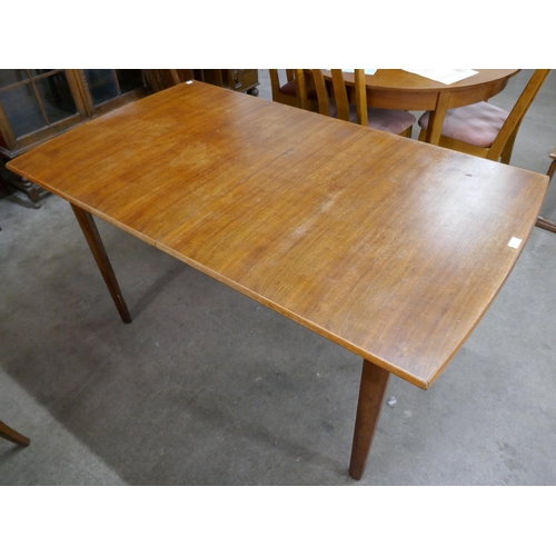 5 - A teak rectangular dining table