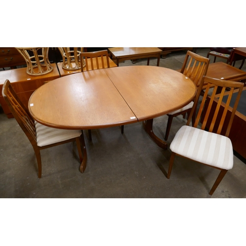 53 - A G-Plan Fresco teak oval extending dining table and four chairs
