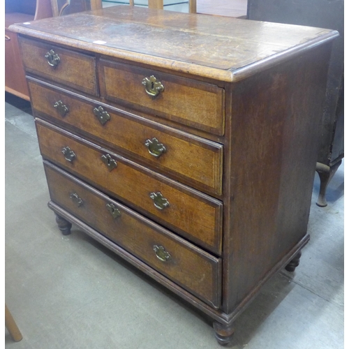 83 - A George III oak chest of drawers