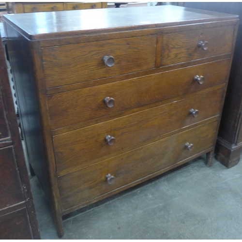 87 - An Arts and Crafts Heals style oak chest of drawers