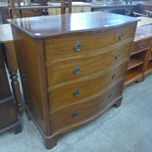 90 - A George III style mahogany serpentine chest of drawers