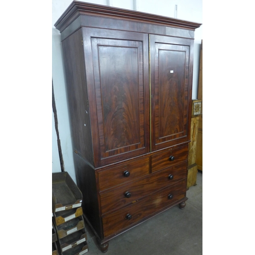 98 - A George IV mahogany linen press