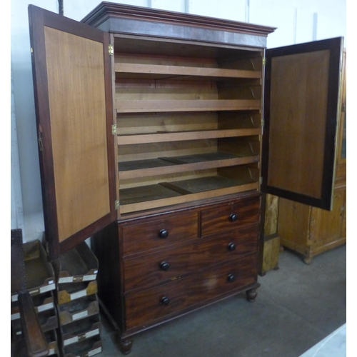 98 - A George IV mahogany linen press