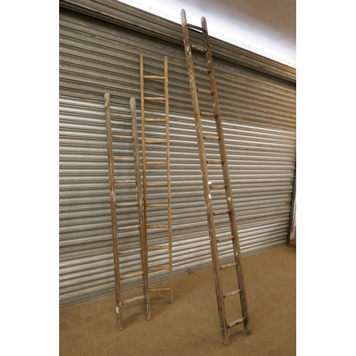 2208 - 3 Wooden stepladders; 9-rung, 11-rung and 13-rung