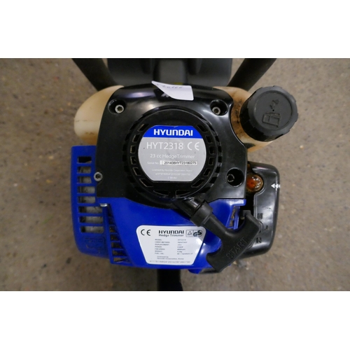 2211 - A McCulloch MAC 838 petrol driven chainsaw and a Hyundai HYT2318 23cc petrol driven hedge trimmer (p... 