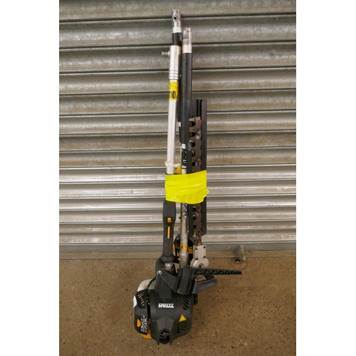 2225 - A petrol driven Titan TT5MTPZ6-2 multi tool with multiple attachments including chainsaw and hedge c... 