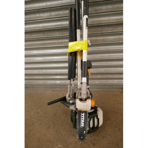 2225 - A petrol driven Titan TT5MTPZ6-2 multi tool with multiple attachments including chainsaw and hedge c... 