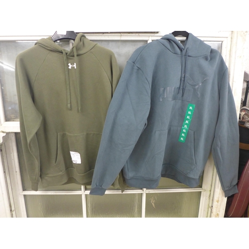 2354 - Two men's hoodies - Puma and Under Armour - sizes M and XL