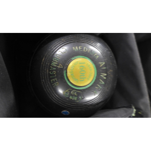 2375 - Four Almark Clubmaster 4 160th Anniversary lawn bowls and carry case