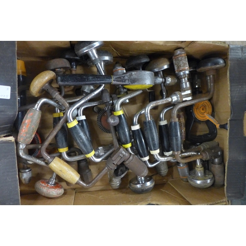 2412 - A large quantity of hand drills and other hand tools including hammers, files, screwdrivers, Stanley... 