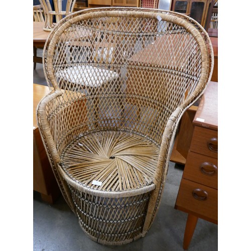 76 - An Italian wicker peacock chair