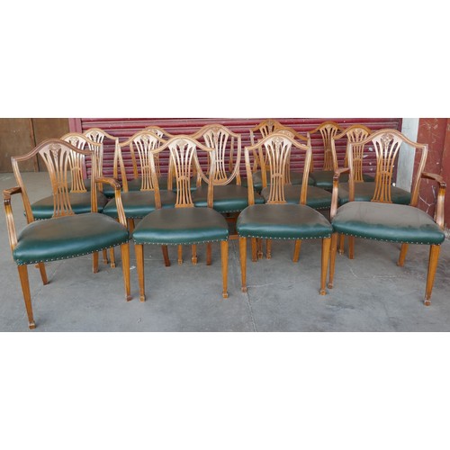 208A - A set of fourteen Hepplewhite style mahogany dining chairs