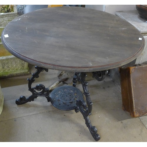 260 - A Victorian style cast iron pub table