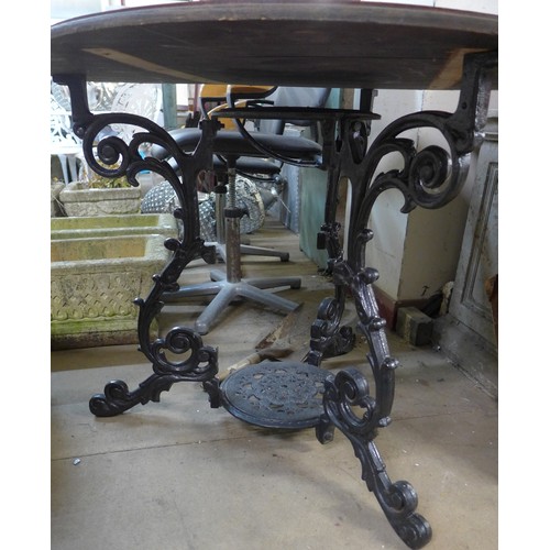 260 - A Victorian style cast iron pub table