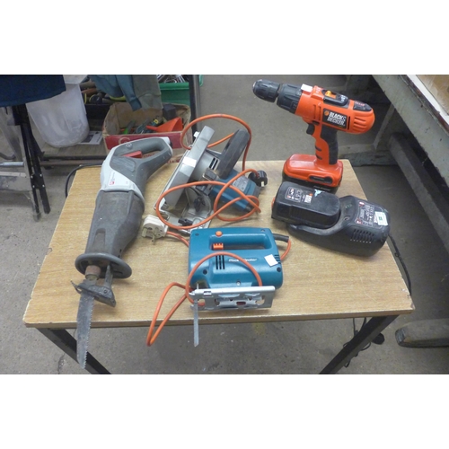 2006 - A selection of power tools including a drill, a saw, a circular saw and a jigsaw