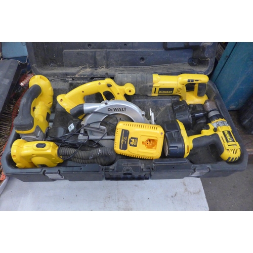 2033 - A quantity of Dewalt tools including two drill, models D (988) and model D (380), a saw, model D (39... 