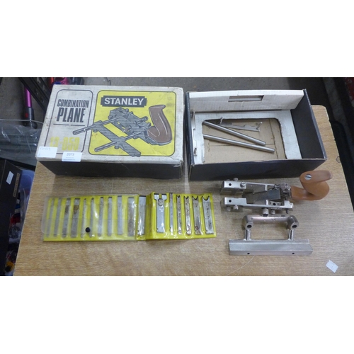 2075 - A Stanley 13-050 combination plane in original box and a set of cutters