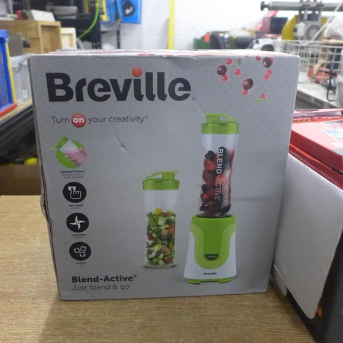 2078 - A Breville blender and a camera printer with paper