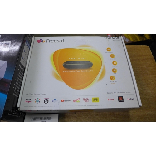 2091 - A FreeSat box with remote control (used), a 5MP film and slide scanner (used) and a portable Smart w... 