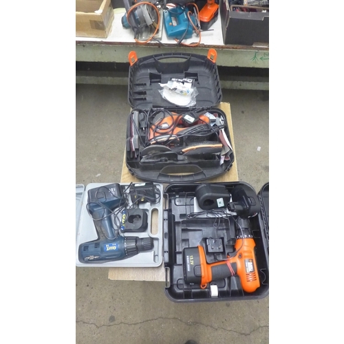 2007 - A selection of power tools in boxes including black and decker FE1320 cordless drill, black and deck... 