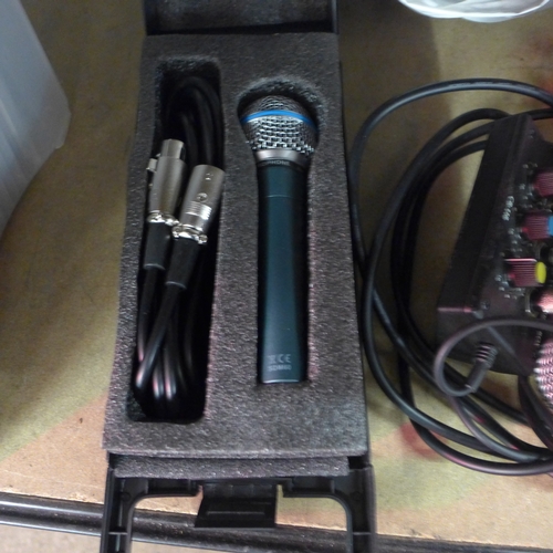 2151 - Three microphones and 4 pairs of assorted headphones