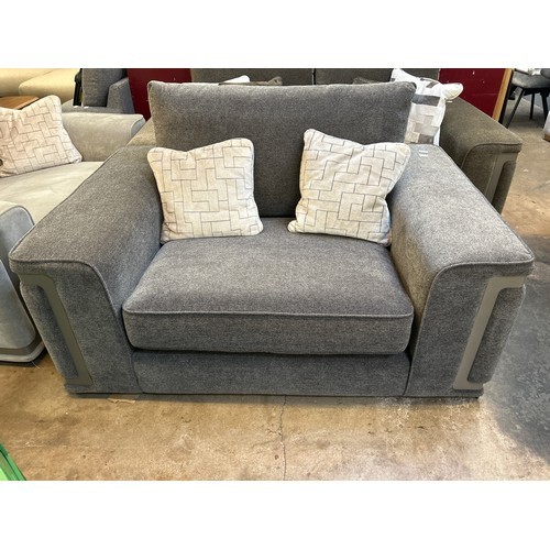 1427 - A mink velvet love seat with steel trim, RRP £2399