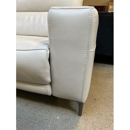 1576 - A three seater white leather and two seater white leather electric reclining sofas