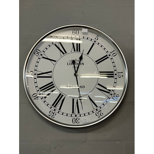 1618 - A large silver wall clock