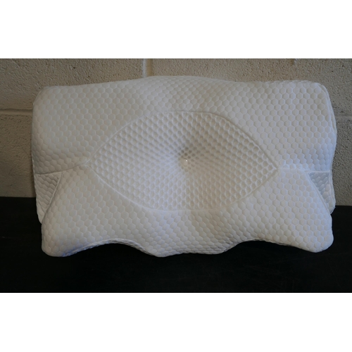 3028 - Three orthopaedic pillows - various sizes and styles * this lot is subject to VAT