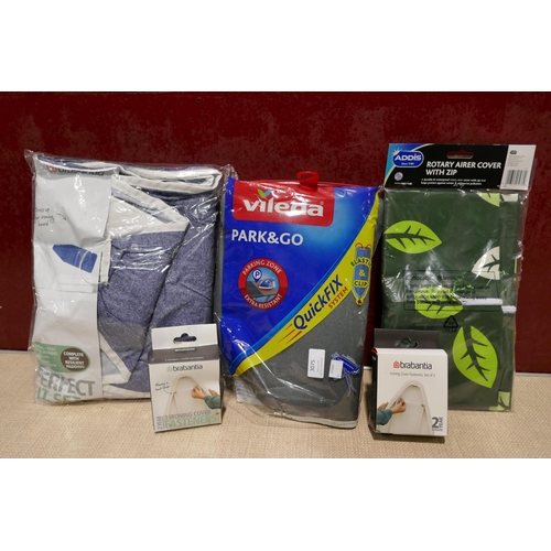 3075 - Assorted laundry related items including Brabantia ironing board clips and cover, Vileda cover and a... 