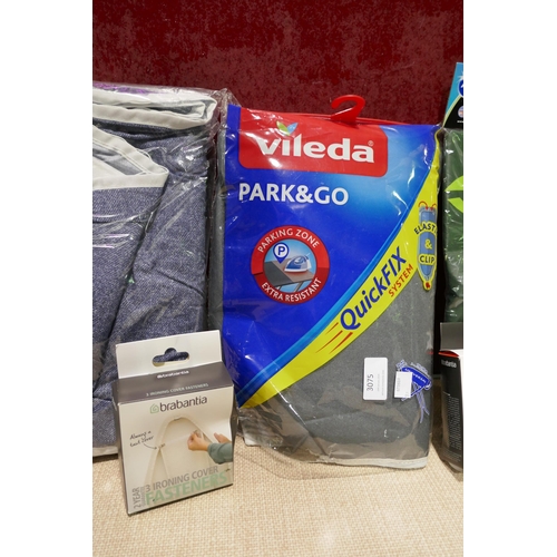 3075 - Assorted laundry related items including Brabantia ironing board clips and cover, Vileda cover and a... 