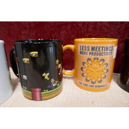 3150 - Five branded mugs:- Marvel, Ninteno, Star Wars, Assorted mugs and a ceramic jug etc. and assorted fl... 