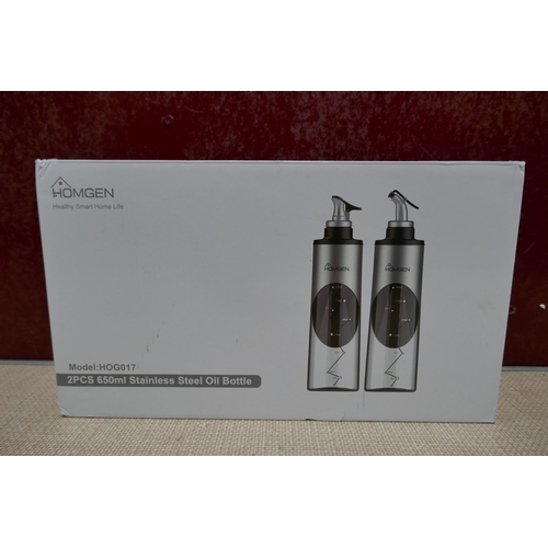 3157 - Pair of 650ml stainless steel oil bottles * This lot is subject to VAT