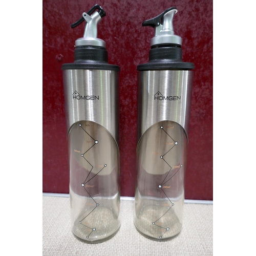 3157 - Pair of 650ml stainless steel oil bottles * This lot is subject to VAT