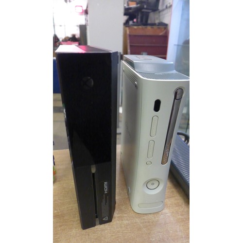 2112 - An Xbox One and an Xbox 360 and a collection of games