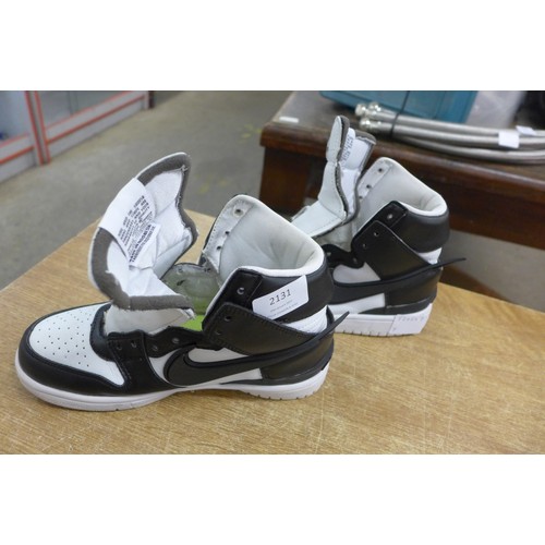 2131 - A pair of UK size 3 Nike Ambush hi-top trainers