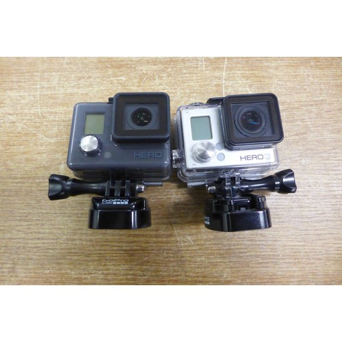 2132 - 2 Go-Pro Action cameras and attachments