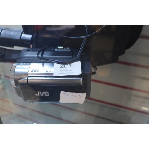 2133 - A JVC mini DV video camera and tripod