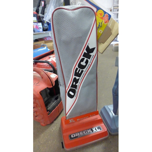 2180 - 2 Oreck vacuum cleaners, commercial XL and Oreck 3 upright