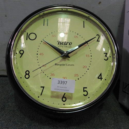 3397 - Three wall clocks (one damaged) *This lot is subject to vat