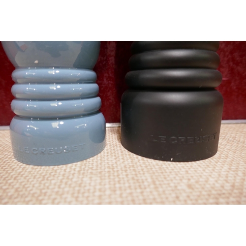 3185 - Le Creuset matte black pepper mill and coastal blue salt mill  * This lot is subject to vat