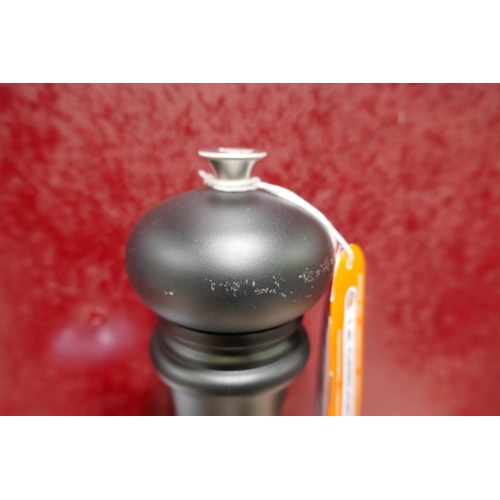 3185 - Le Creuset matte black pepper mill and coastal blue salt mill  * This lot is subject to vat