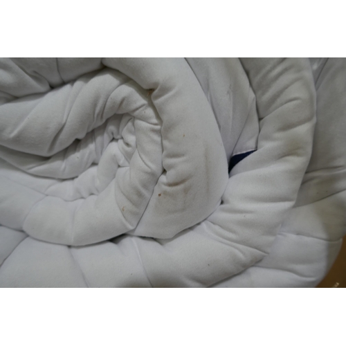 3211 - Rolled Duvet in bag *This lot is subject to vat