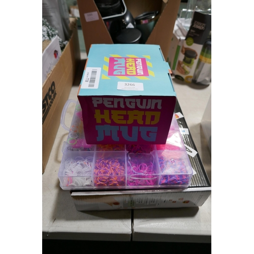 3266 - Lightbox, penguin mug and loom bands *This lot is subject to vat