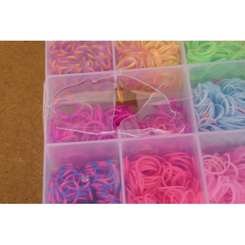 3266 - Lightbox, penguin mug and loom bands *This lot is subject to vat
